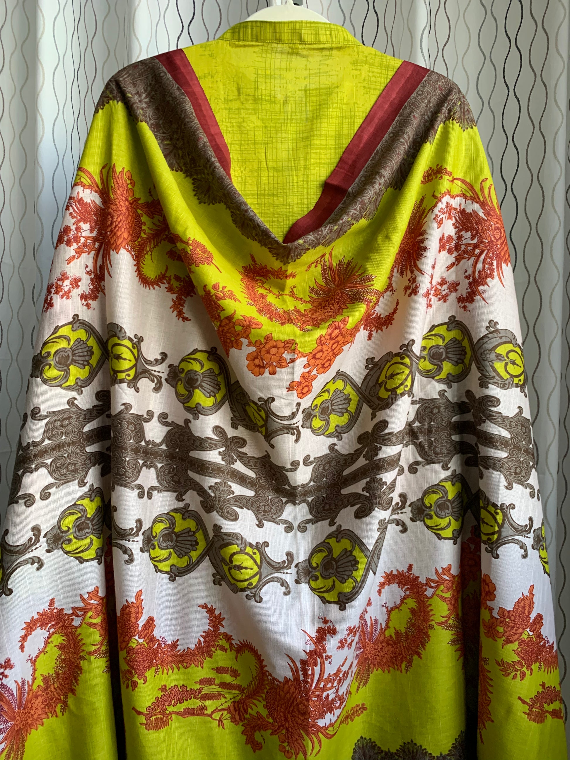 Modest Khaddar Suit for Women:  it offers a Modest Style and Custom Stitch. Crafted with Exotic Khaddar Fabric, which is a blend of Organic Cotton and Wool Slub. This 3 piece suit includes one Tunic, matching Trouser and a full Shawl, perfect for the winter season. Available in Lime Green color and S-M-L-XL  sizes, and guarantees both comfort and elegance.