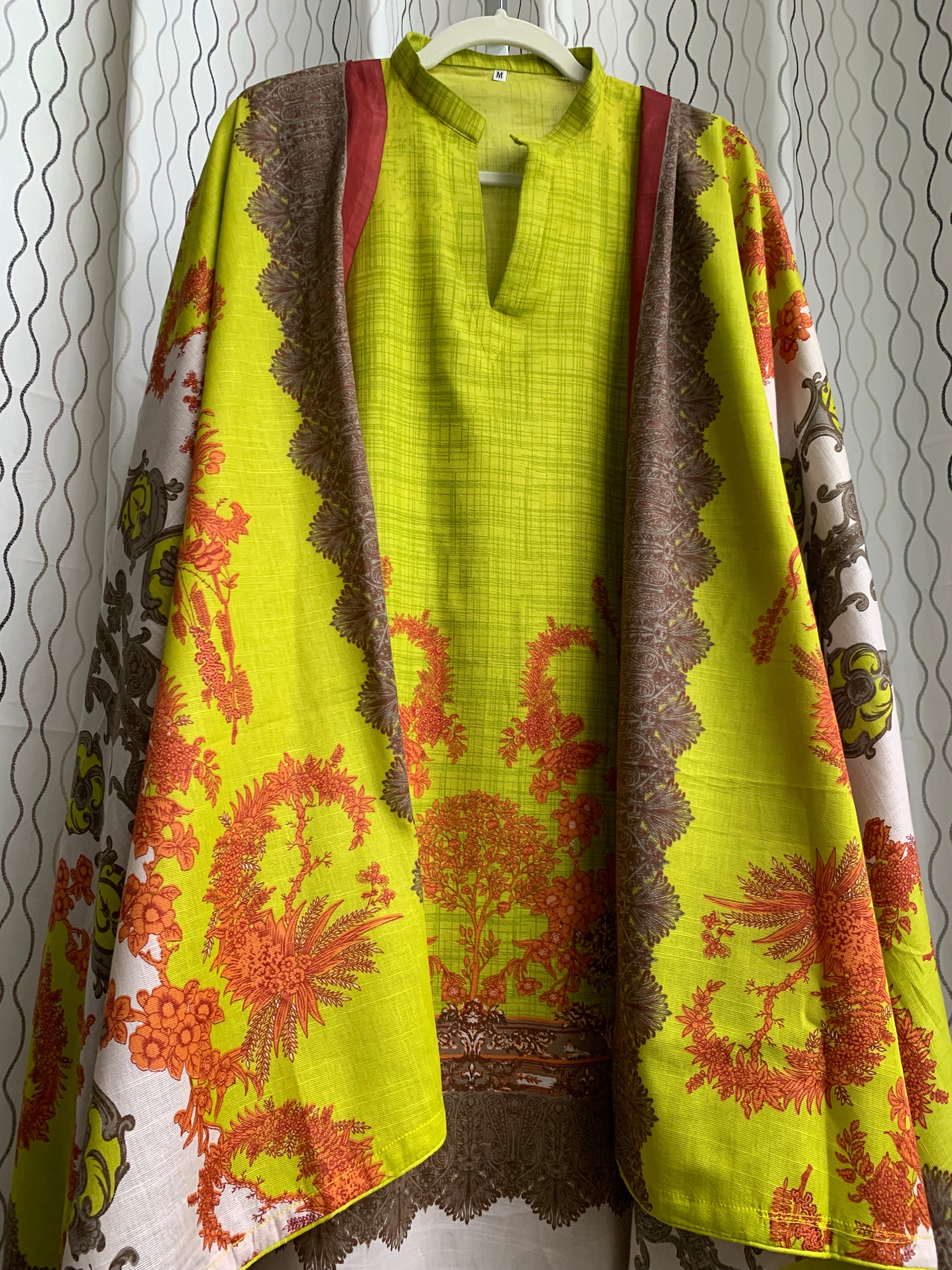 Modest Khaddar Suit for Women:  it offers a Modest Style and Custom Stitch. Crafted with Exotic Khaddar Fabric, which is a blend of Organic Cotton and Wool Slub. This 3 piece suit includes one Tunic, matching Trouser and a full Shawl, perfect for the winter season. Available in Lime Green color and S-M-L-XL  sizes, and guarantees both comfort and elegance.
