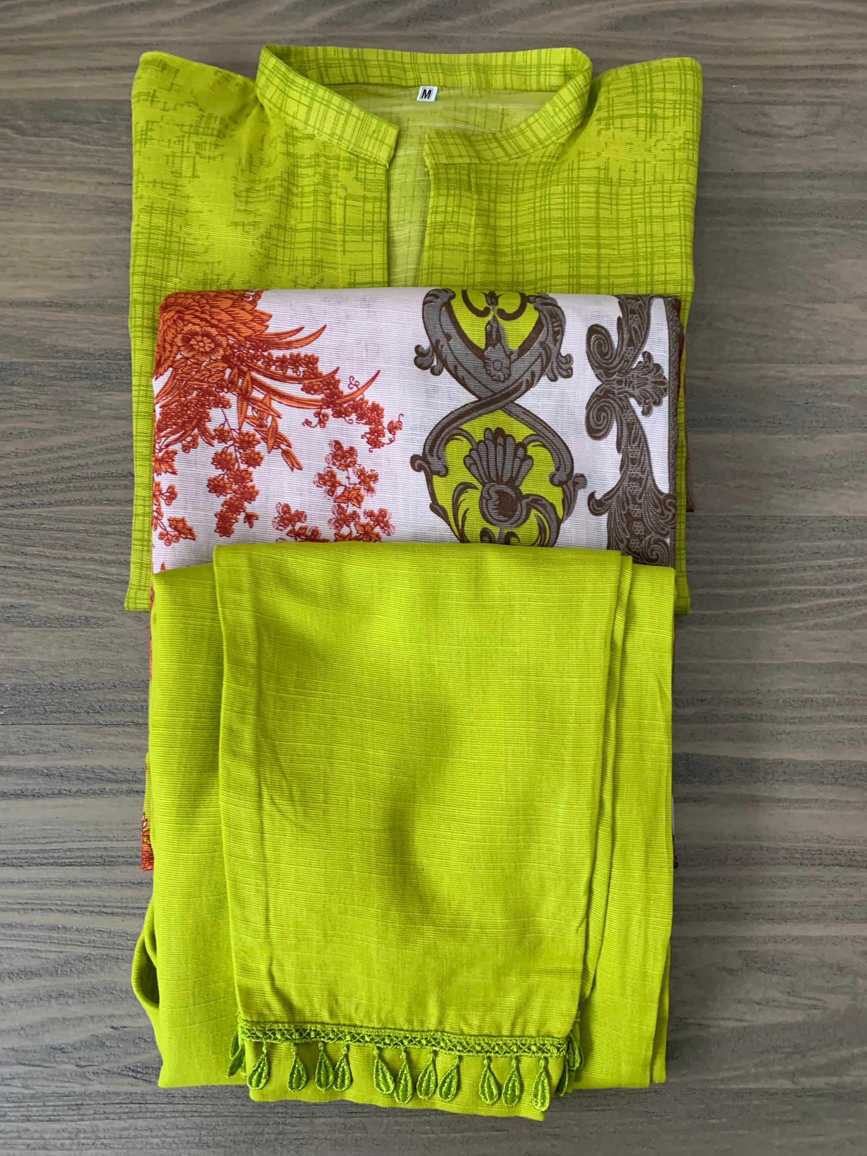 Modest Khaddar Suit for Women:  it offers a Modest Style and Custom Stitch. Crafted with Exotic Khaddar Fabric, which is a blend of Organic Cotton and Wool Slub. This 3 piece suit includes one Tunic, matching Trouser and a full Shawl, perfect for the winter season. Available in Lime Green color and S-M-L-XL  sizes, and guarantees both comfort and elegance.