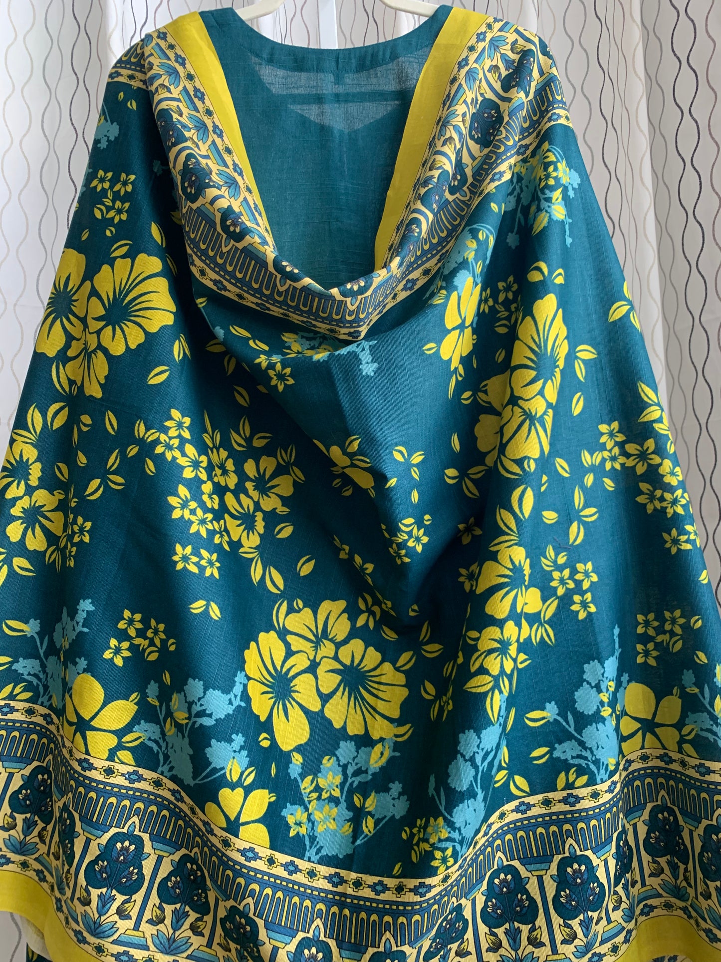 Modest Khaddar Suit for Women: it offers a Modest Relax Fit Style along with Custom Stitch. Crafted with Exotic Khaddar Fabric, which is a blend of Organic Cotton and Wool Slub. This 3 piece suit includes one Tunic, matching Trouser and a full Shawl, perfect for the winter season. Available in Dark Green color and S-M-L-XL sizes, and guarantees both comfort and elegance.