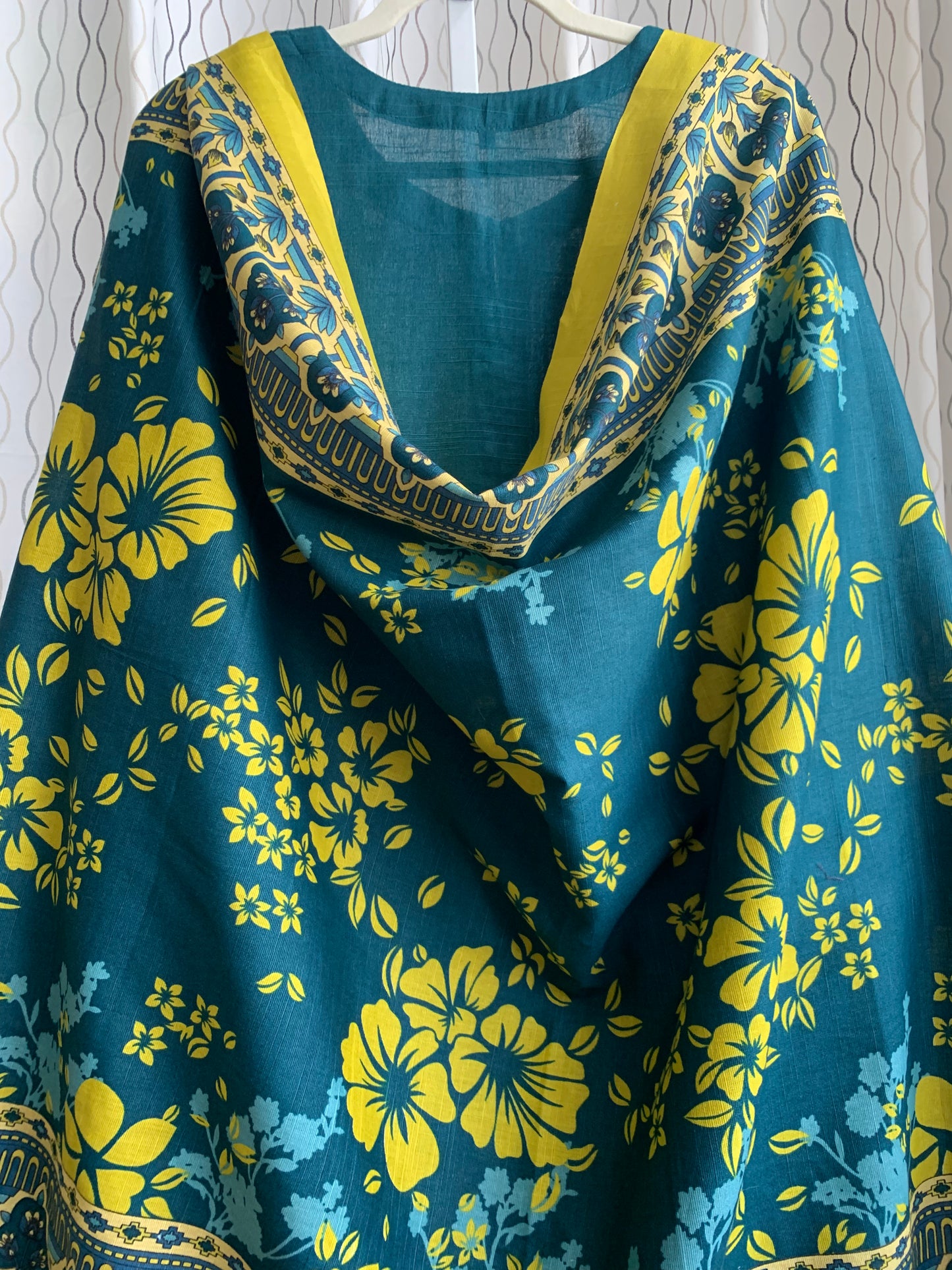 Modest Khaddar Suit for Women: it offers a Modest Relax Fit Style along with Custom Stitch. Crafted with Exotic Khaddar Fabric, which is a blend of Organic Cotton and Wool Slub. This 3 piece suit includes one Tunic, matching Trouser and a full Shawl, perfect for the winter season. Available in Dark Green color and S-M-L-XL sizes, and guarantees both comfort and elegance.