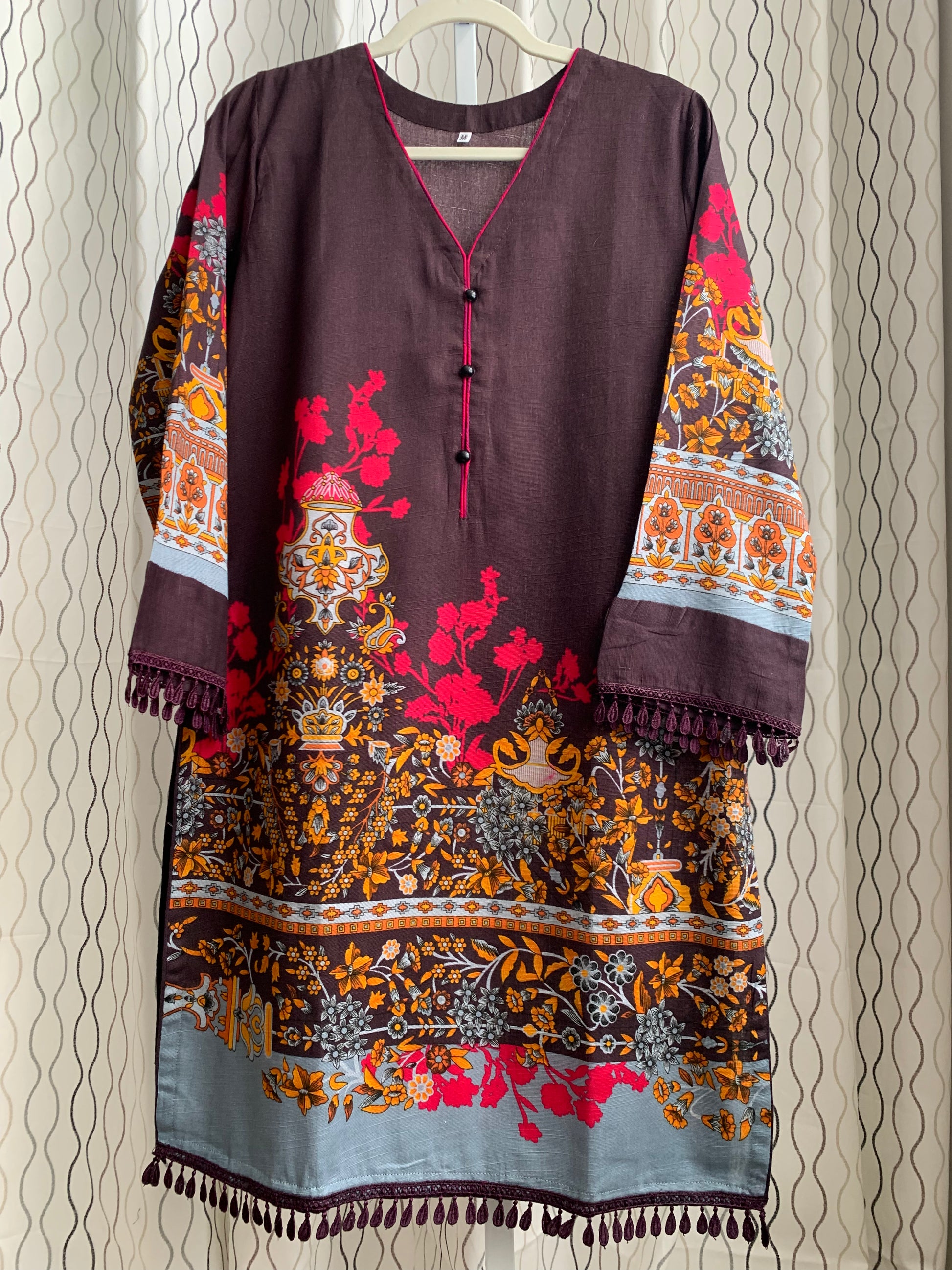 Modest Khaddar Suit for Women:  it offers a Modest Relax Fit Style along with Custom Stitch. Crafted with Exotic Khaddar Fabric, which is a blend of Organic Cotton and Wool Slub. This 3 piece suit includes one Tunic, matching Trouser and a full Shawl, perfect for the winter season. Available in Dark Brown color and S-M-L-XL  sizes, and guarantees both comfort and elegance.
